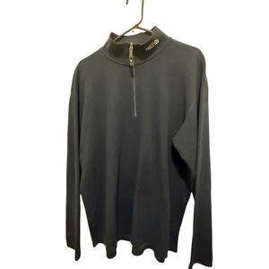 The North Face Men's navy blue Half-Zip Sweatshirt logo on the front zipper.New